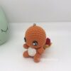 Imagen de un amigurumi Charmander con llavero